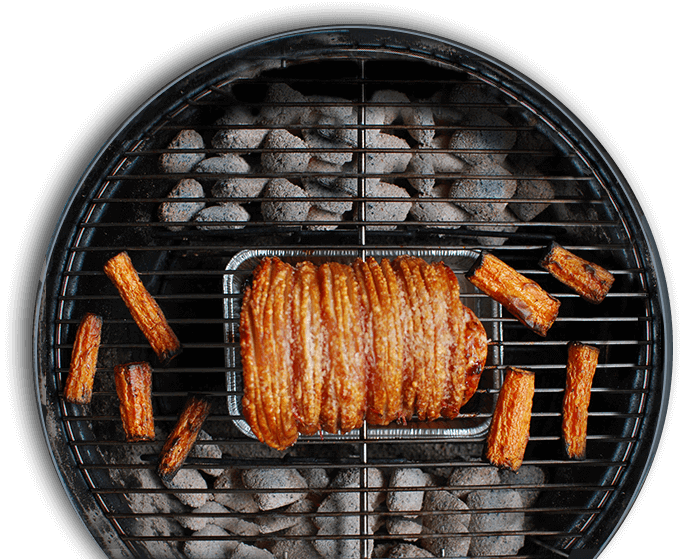 rotisserie chicken on charcoal grill 689x559