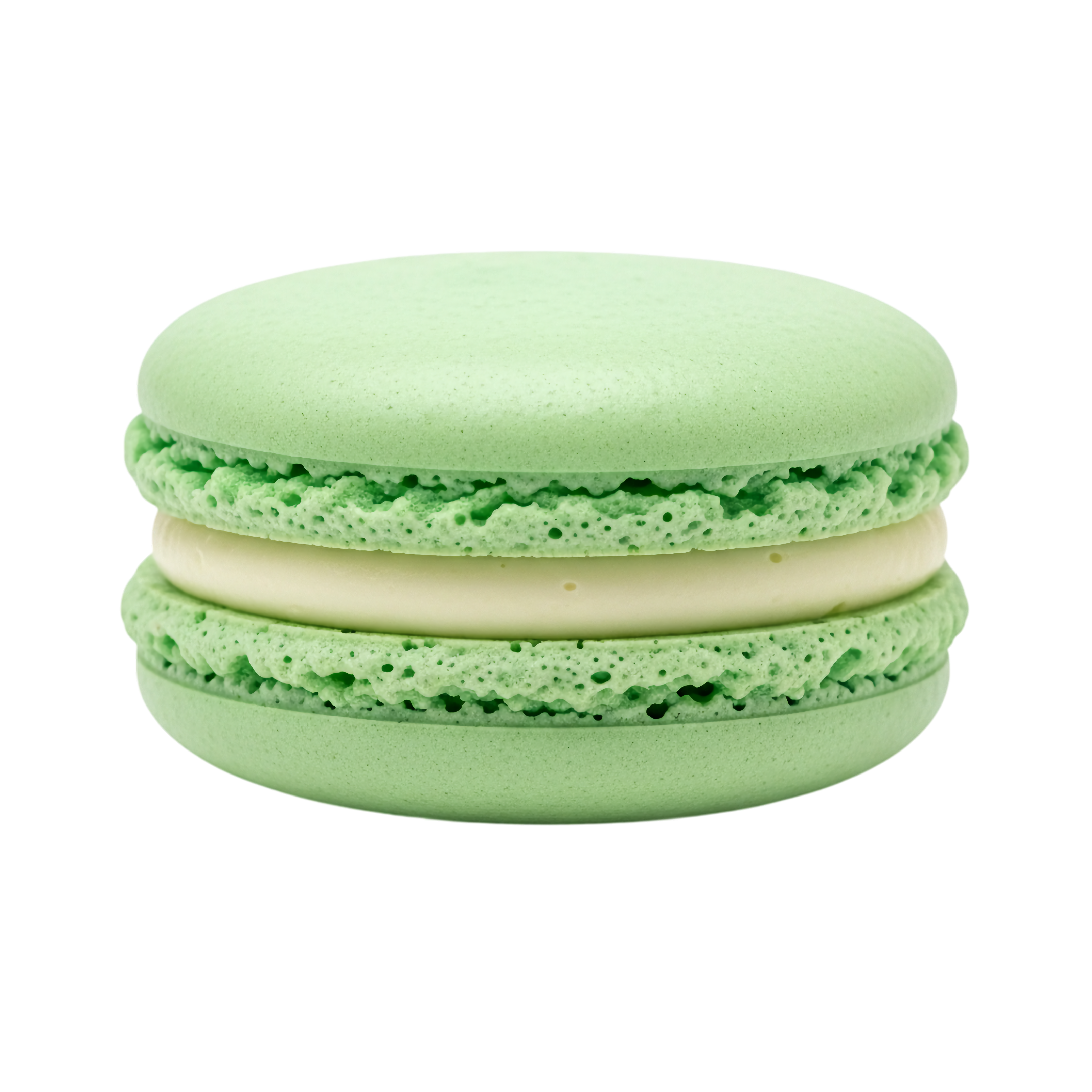 green dessert macaron with creamy