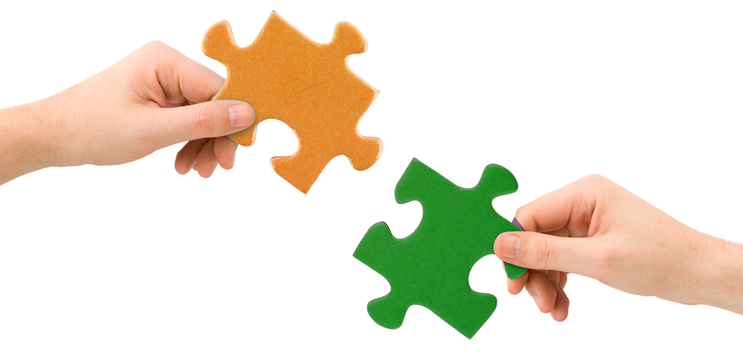 Two Hands Joining Orange and Green Puzzle Pieces