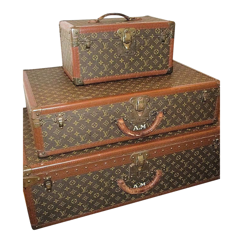 Stacked Vintage Canvas Trunks with Brass Latches