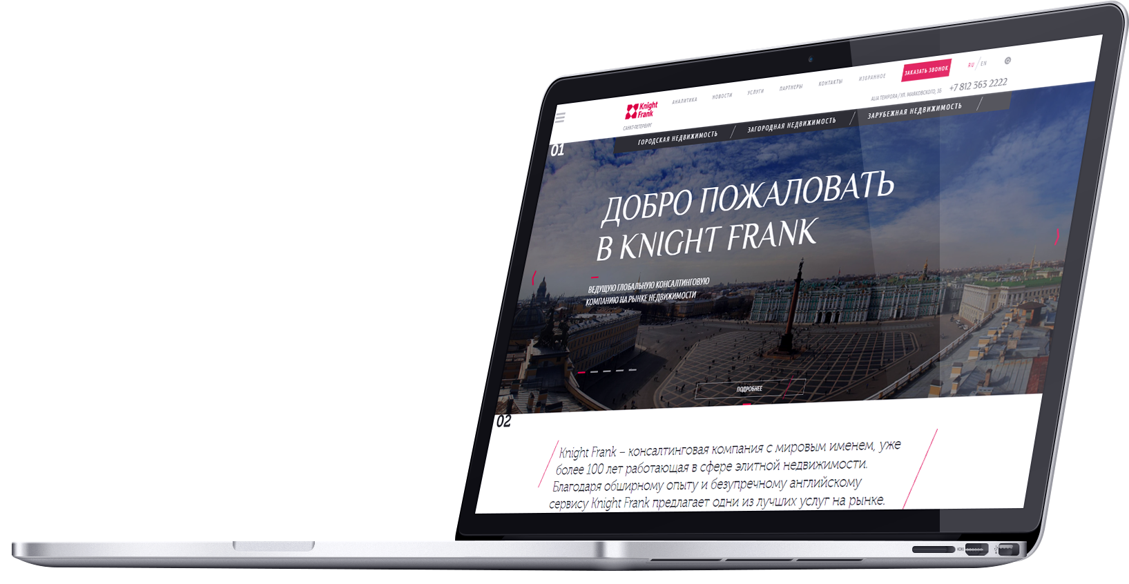 Silver Laptop Mockup with Real Estate Homepage