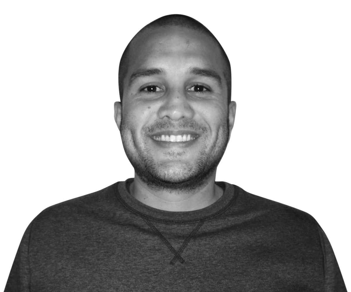Smiling Man with Stubble in Grey Sweatshirt