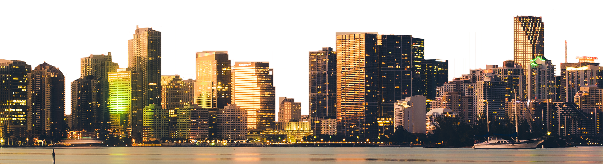 Glowing Skyline Towers at Dusk over Water
