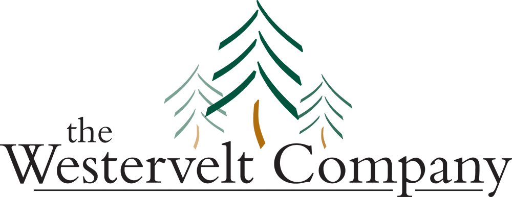Westervelt Company Logo with Green Pine Trees