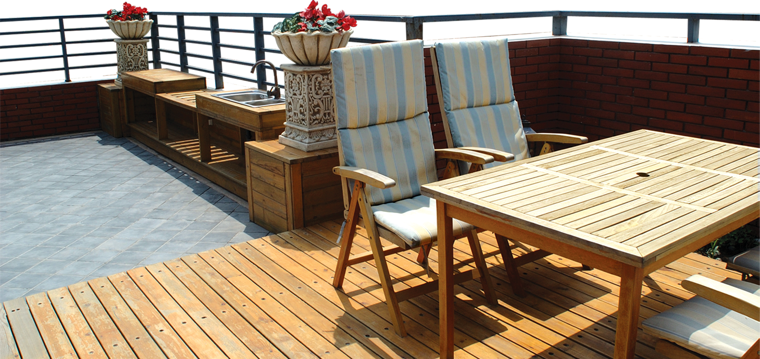 Wooden Rooftop Deck with Striped Chairs
