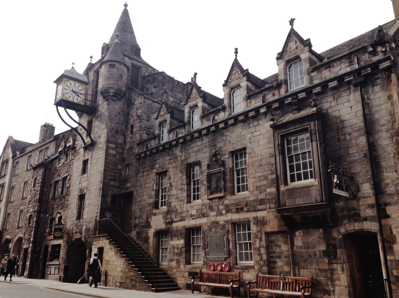 Gothic Stone Building with Clock Tower