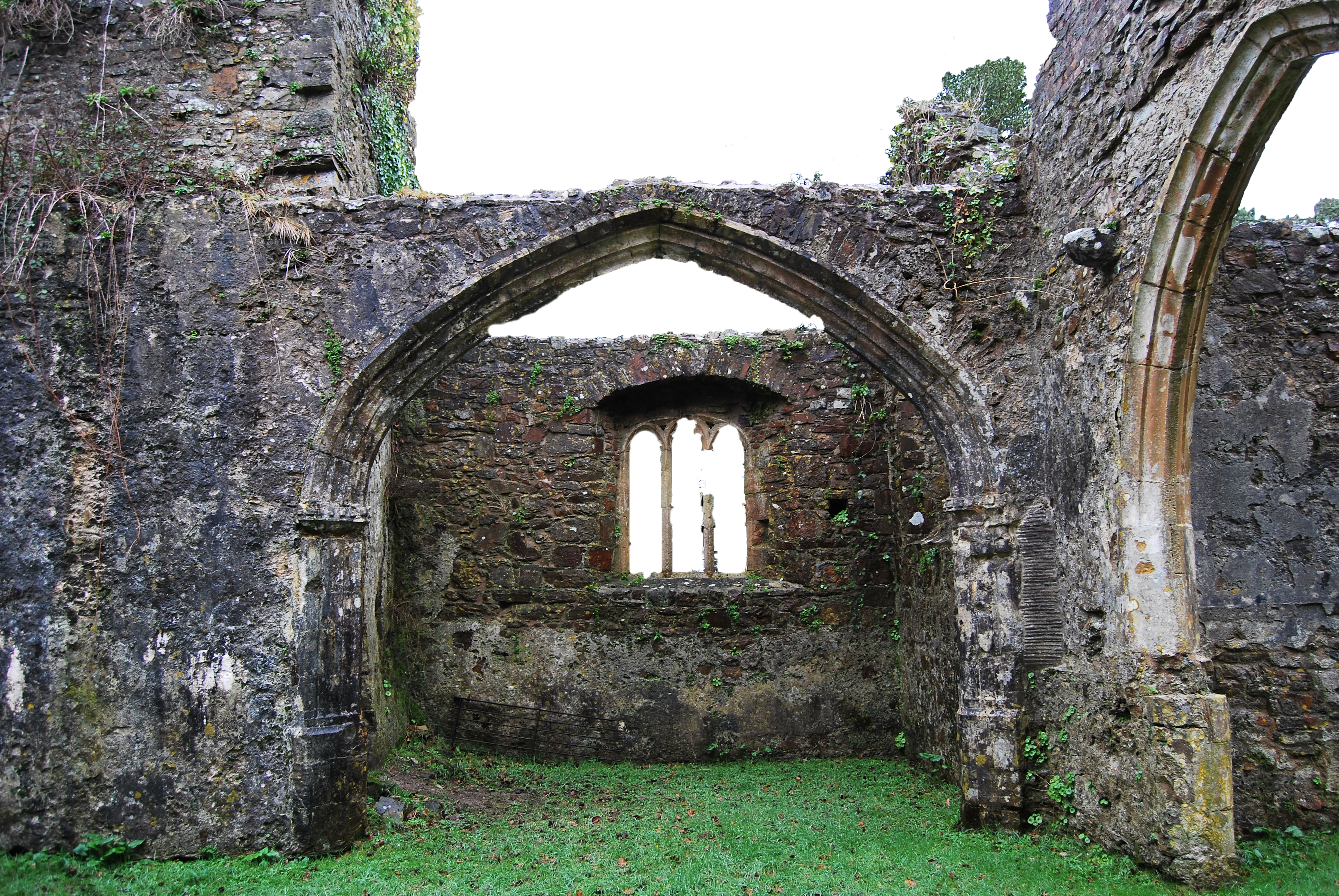 Weathered Stone Church Ruin with Gothic Arch