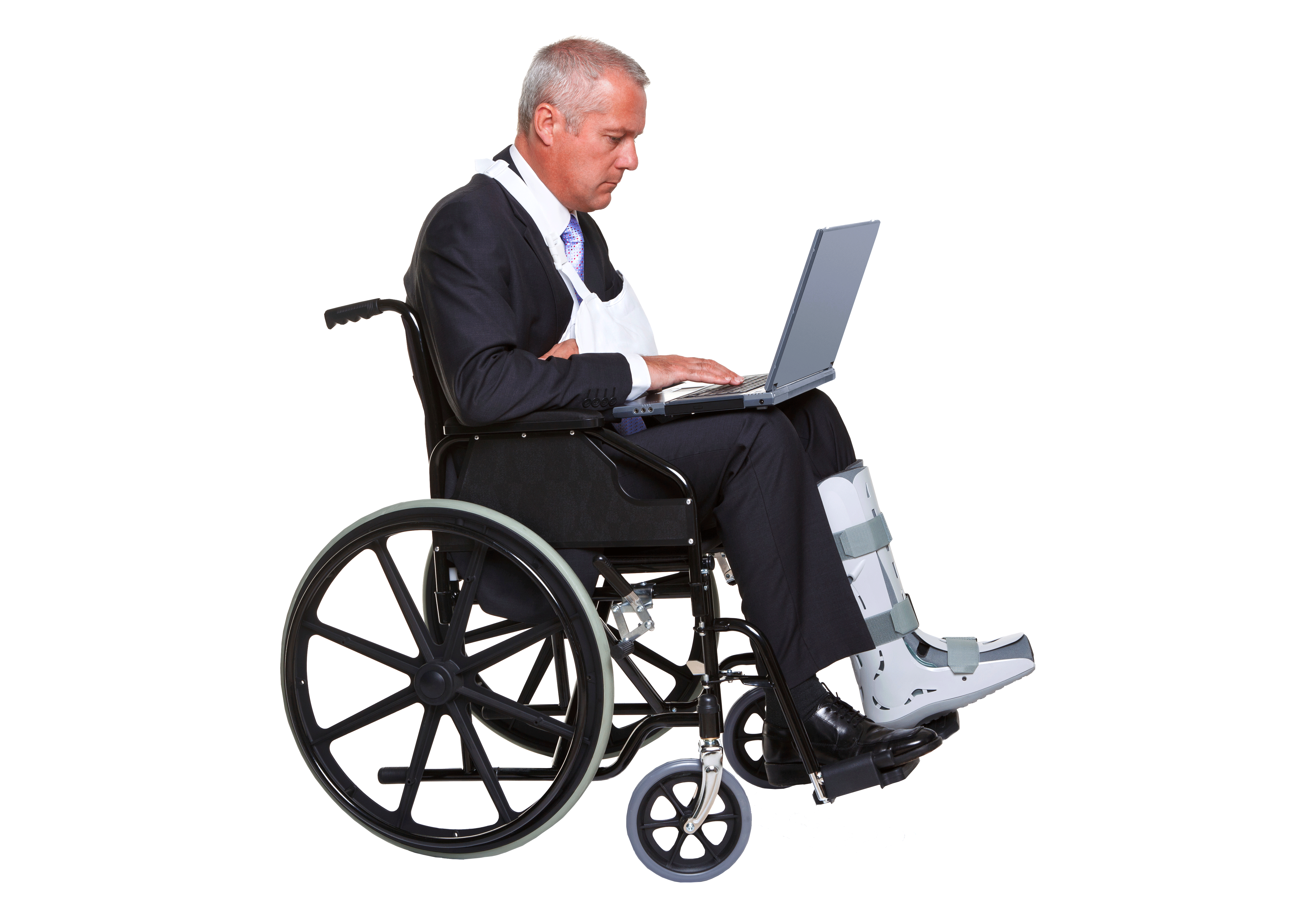 Businessman working on laptop while seated in wheelchair Isolated Transparent Background PNG Image