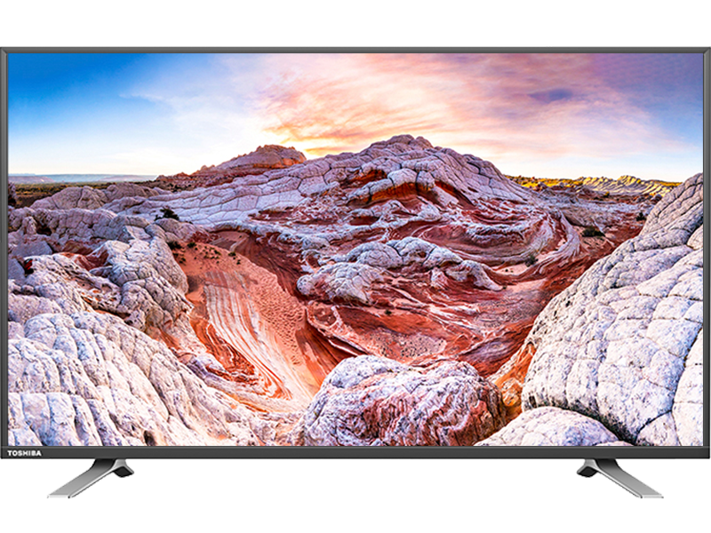 Large Flat Screen TV Displaying Colorful Desert Landscape PNG Image