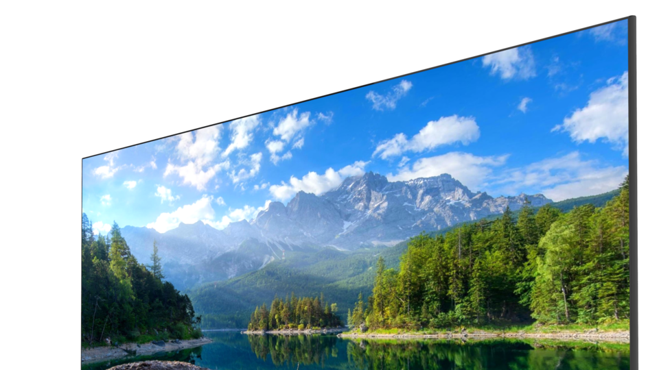 Large Screen TV Displaying Green Mountain Valley And Blue Sky PNG Photo
