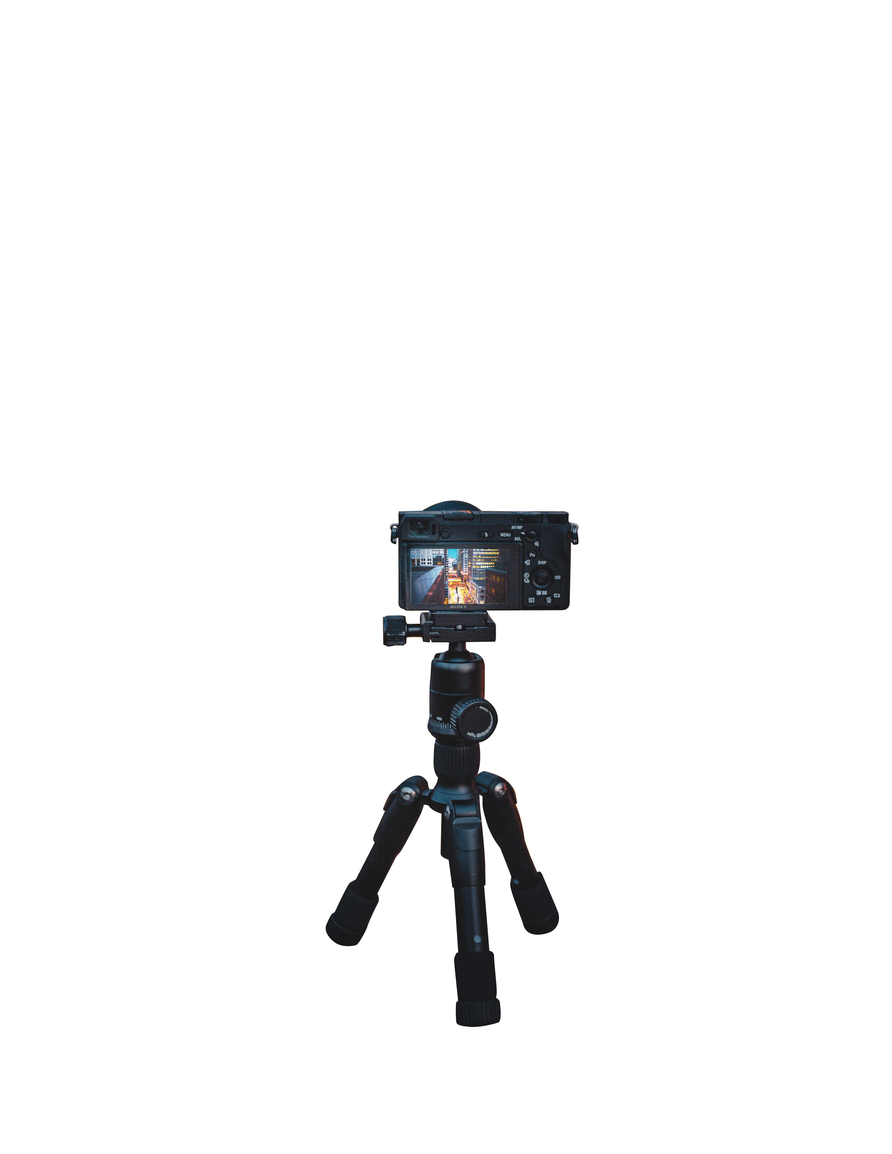 Compact Digital Camera On Mini Tripod Isolated Transparent PNG Image