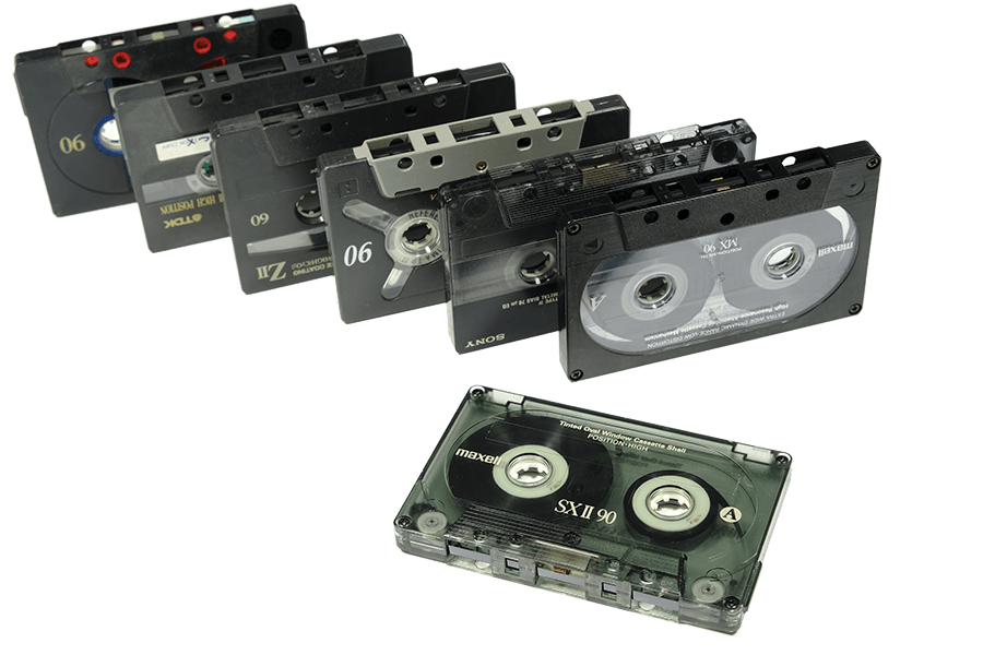 Collection Of Vintage Black Audio Cassette Tapes In Perspective Isolated Transparent PNG Image