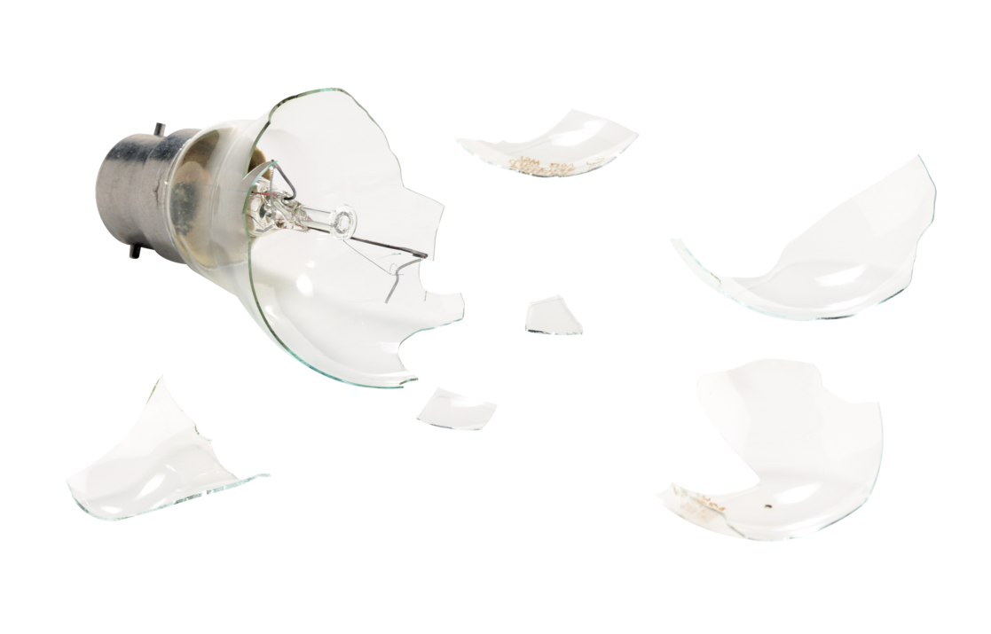 Light Bulb Shattering Into Clear Glass Pieces Around Metal Base Transparent Background PNG Image
