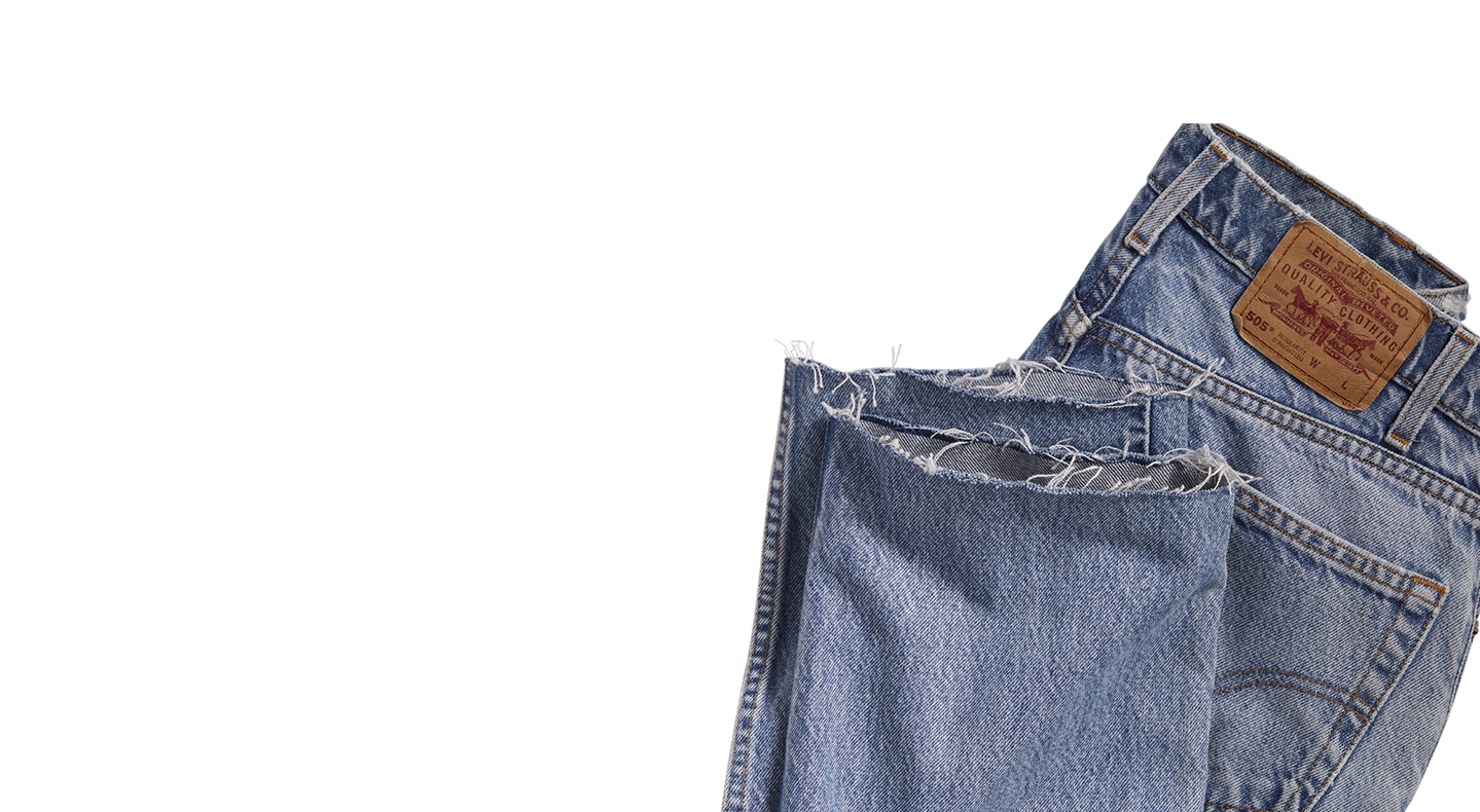 Close Up Of Blue Denim Jeans Pocket Waistband And Leather Patch