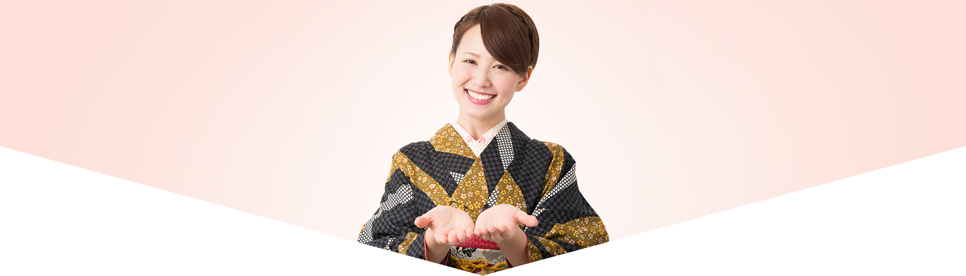 Young Woman In Pale Pink Floral Kimono With Traditional Hair Flowers