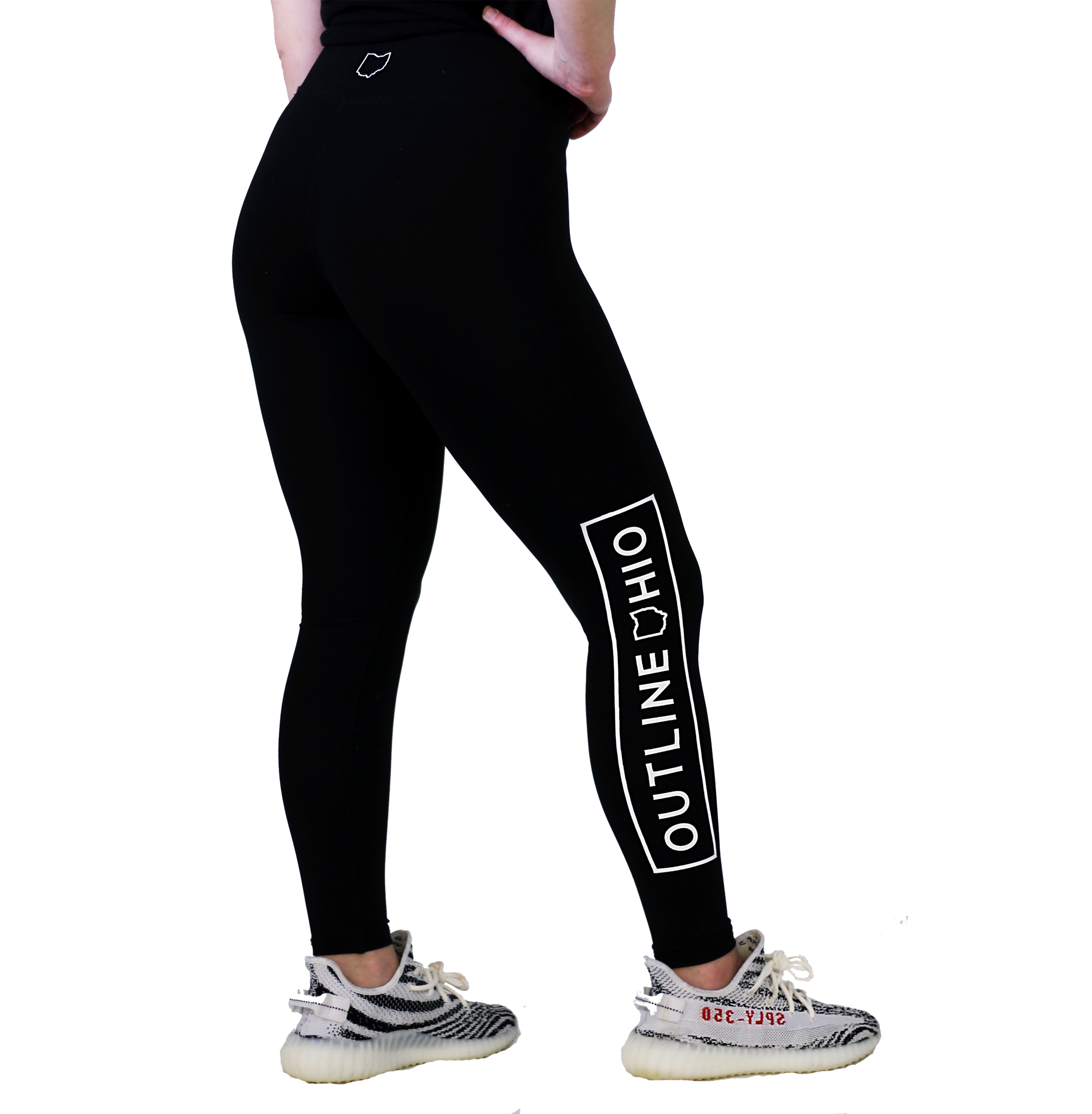 Black Leggings With Vertical White Logo Text On Activewear Model
