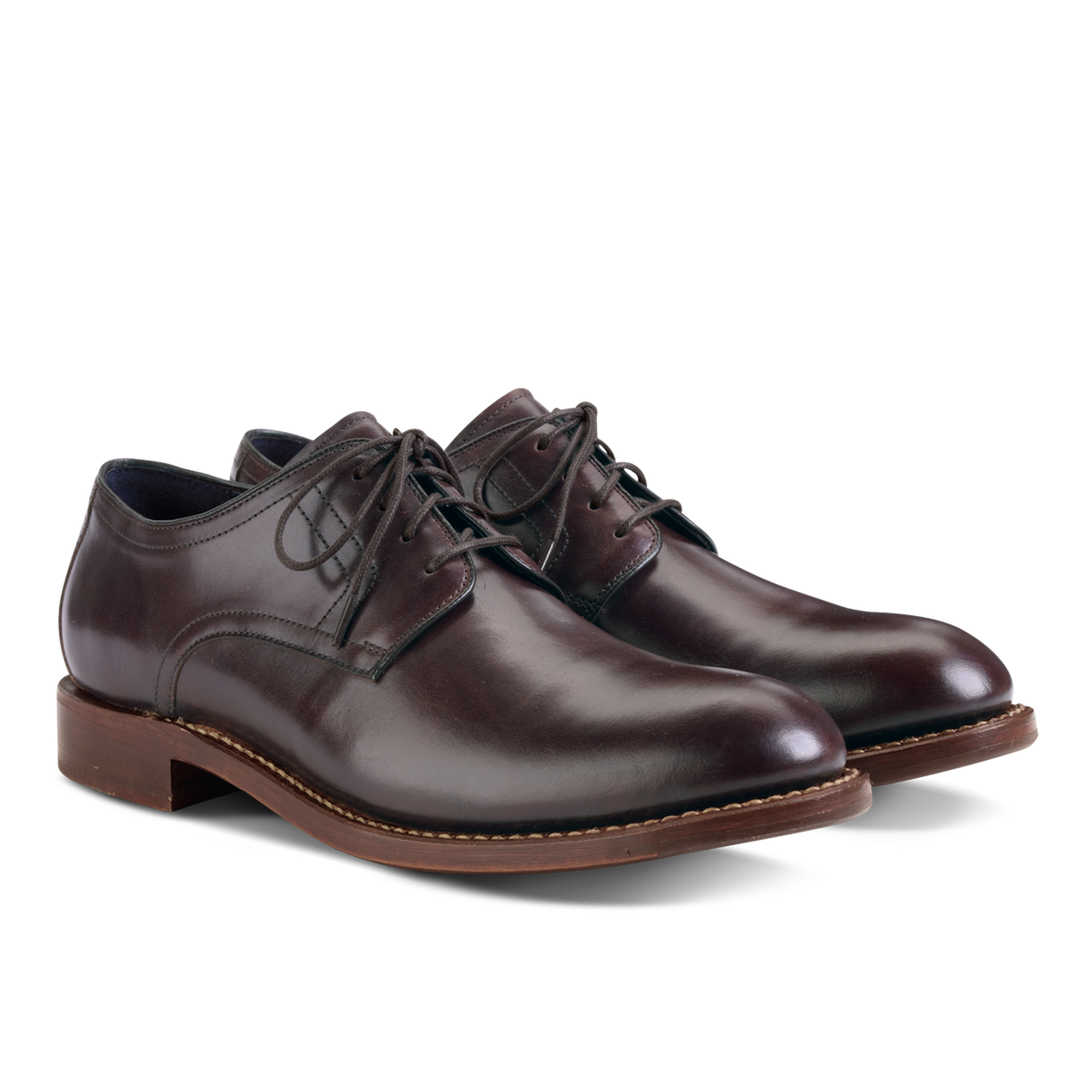 Pair Of Brown Leather Derby Shoes With Classic Lace Up Styling PNG