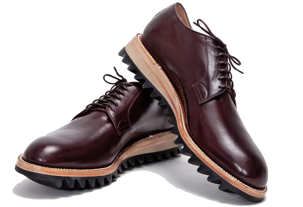 Pair Of Burgundy Leather Lace Up Boots With Rugged Rubber Soles PNG
