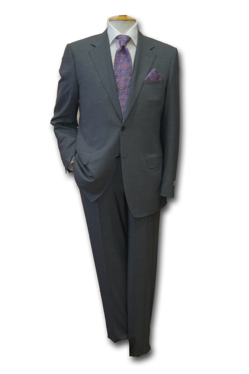 Man Wearing Gray Two Piece Suit With Purple Tie Full Length View