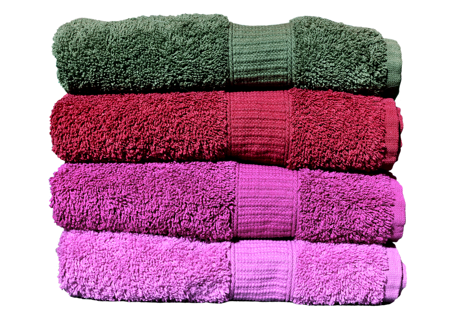 Pile Of Colorful Pink Green And Blue Towels Transparent PNG Image