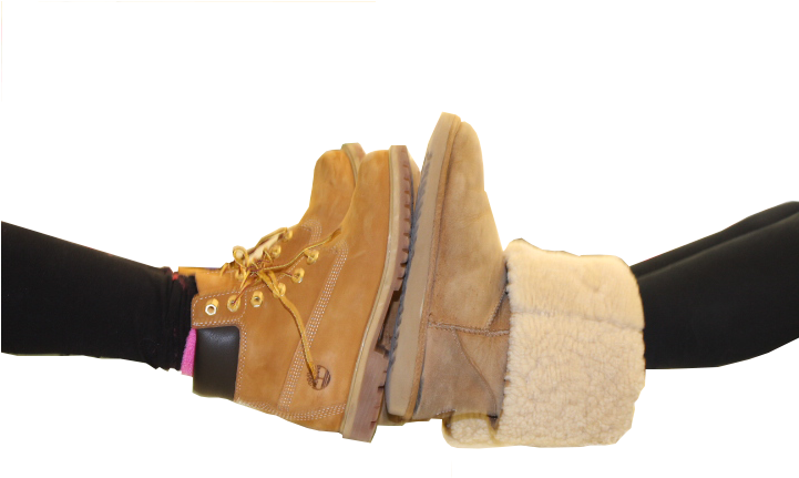 Tiny Tan Baby Sheepskin Boots With Fur Trim Held In Hands PNG Illustration