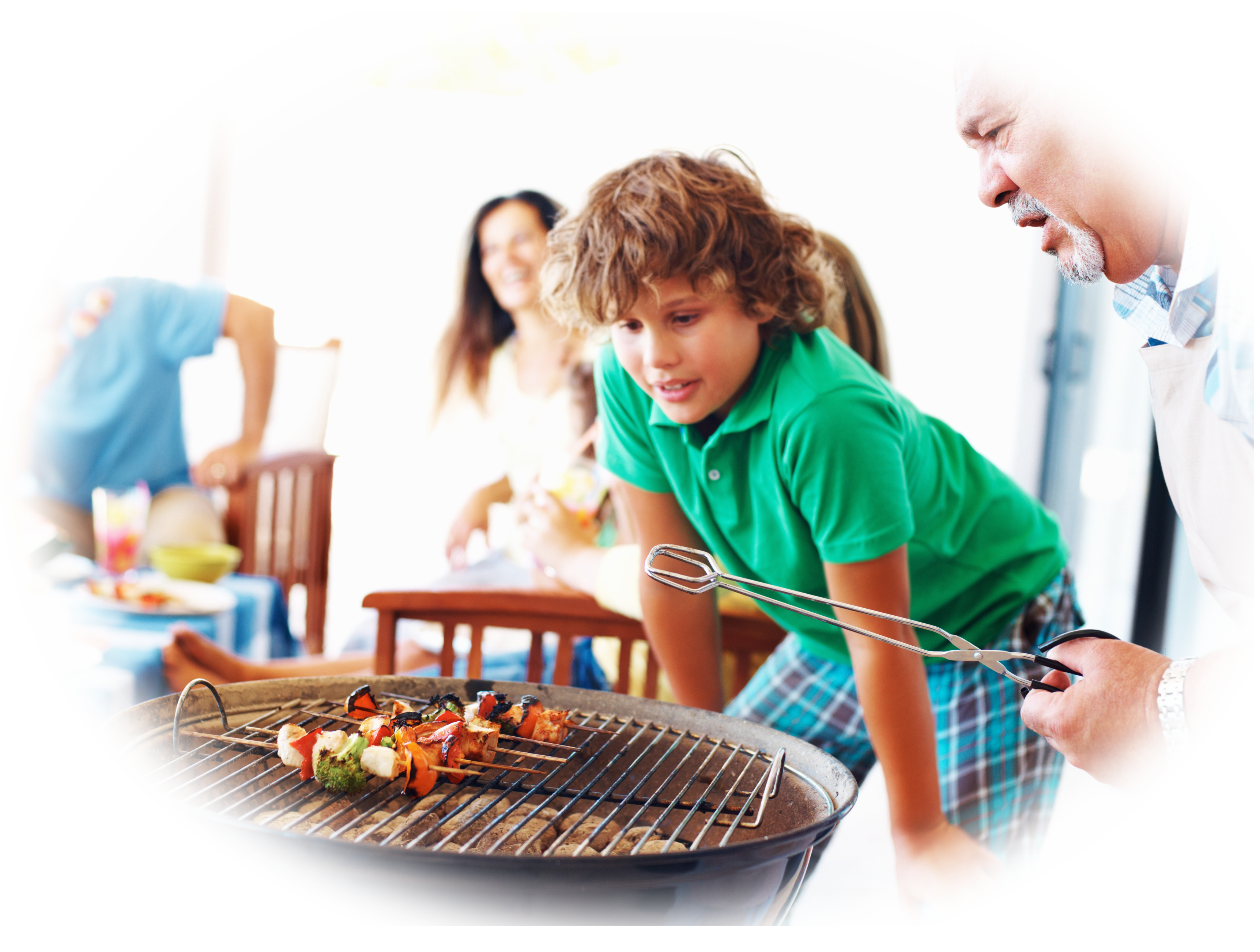 Family Outdoor Barbecue Picnic With People Grilling In The Garden PNG Photo
