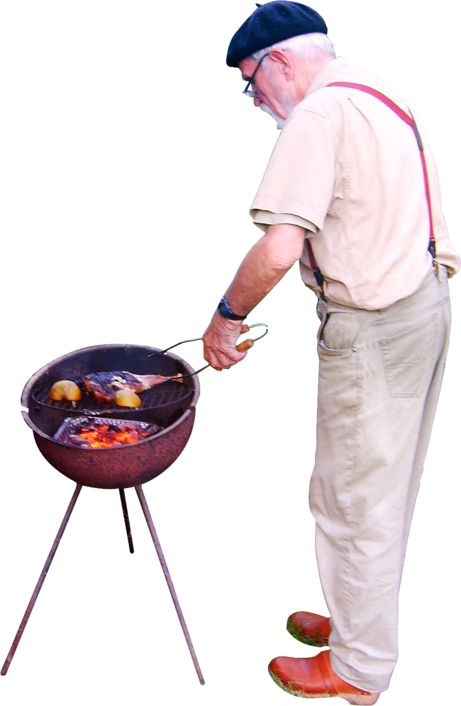 Man Grilling Food Outdoors On Small Charcoal Barbecue PNG Photo