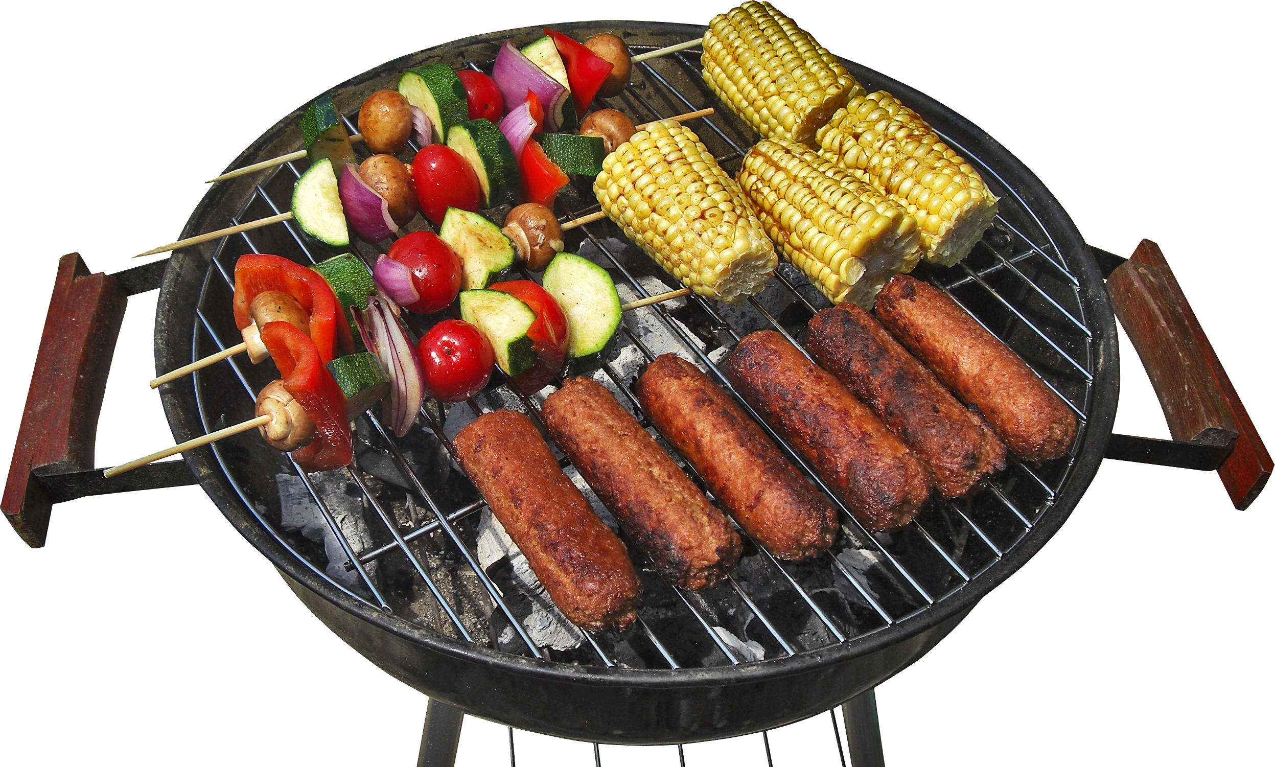 Round Charcoal Barbecue Grill With Corn Sausages And Vegetable Skewers PNG Image