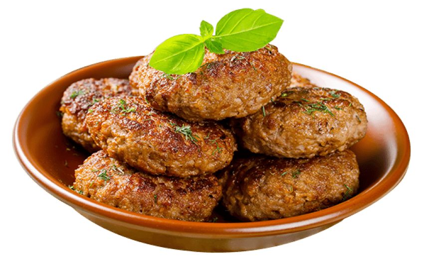 Round Homemade Meat Cutlets In A Bowl On Green Background PNG Photo