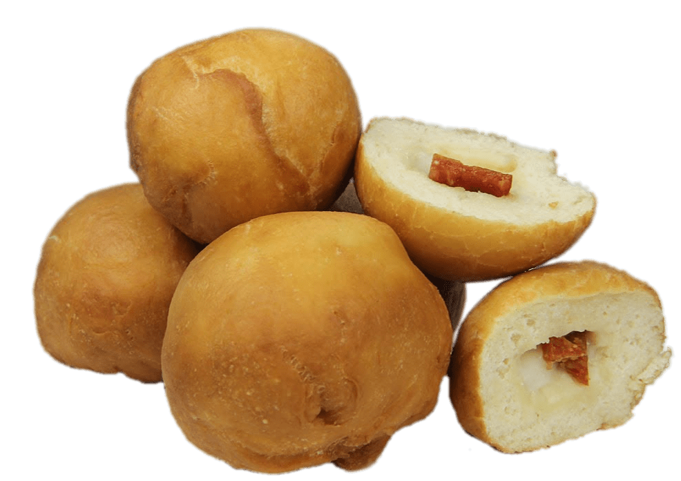 Golden Stuffed Fried Pastry Bites On Green Background PNG Photo