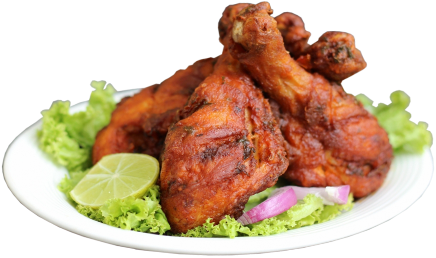 Spicy Red Glazed Chicken Drumsticks with Lettuce on Plate PNG Food Image