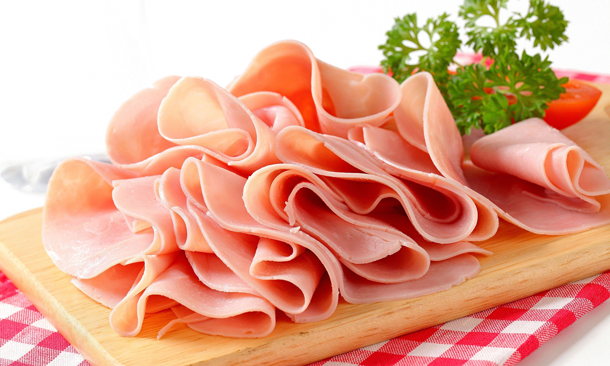 Thin Prosciutto Meat Slices on Wooden Serving Board with Greens PNG Food Image