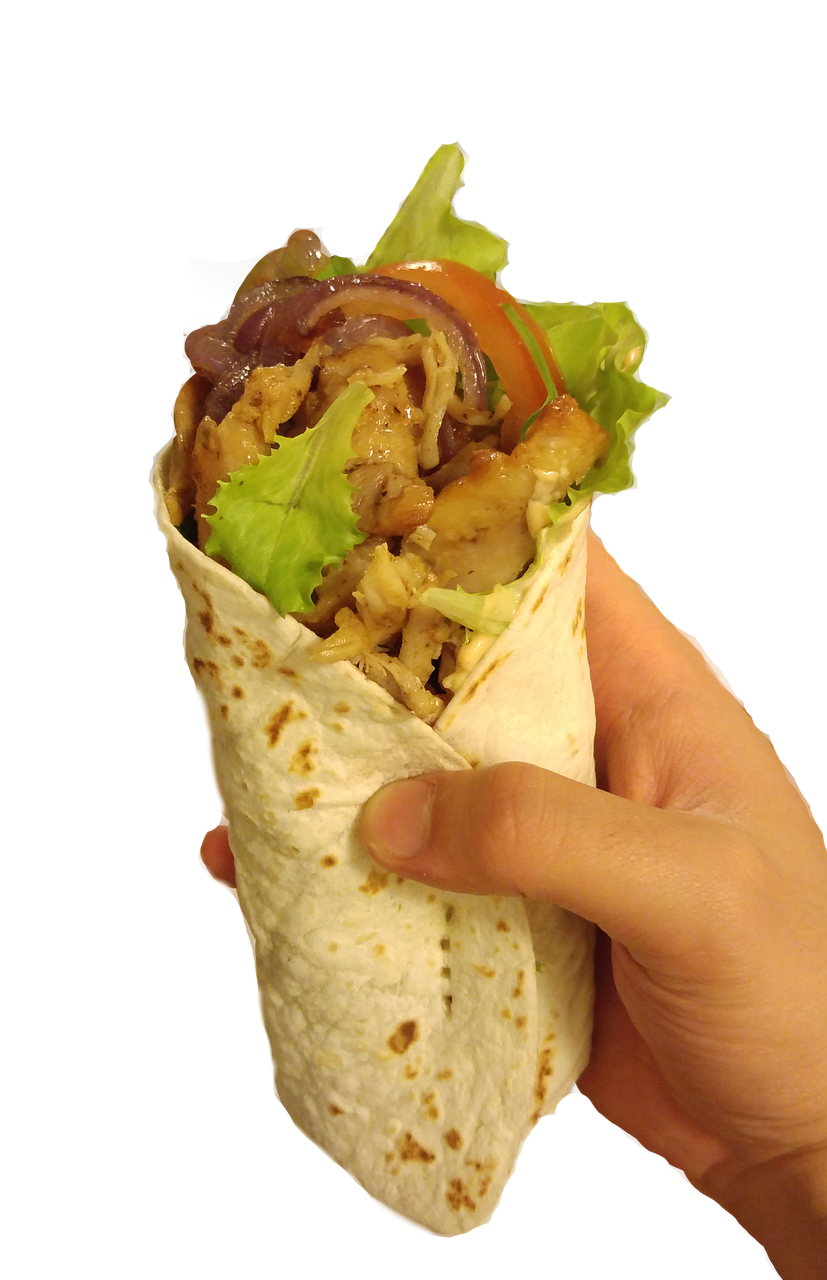 Handheld Kebab Wrap Filled with Grilled Meat and Fresh Greens PNG Food Image