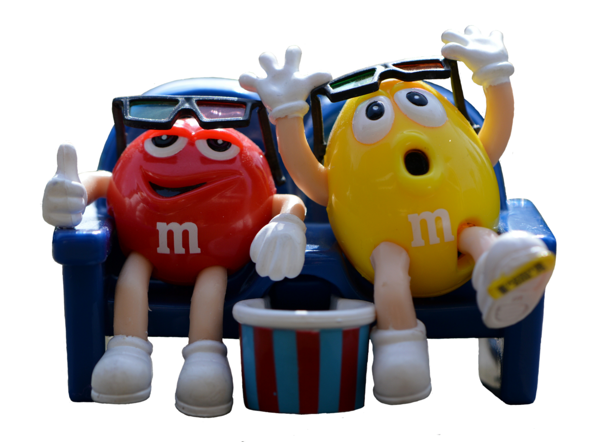 Blue and Yellow M&M Candy Characters at Movie Theater with Popcorn PNG Illustration
