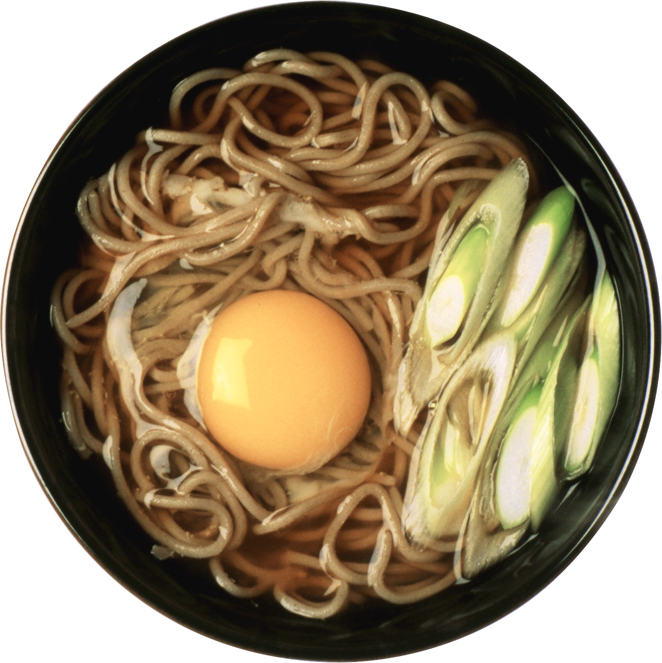 Soba Noodle Soup with Soft Boiled Egg and Seaweed in Black Bowl PNG Food Image