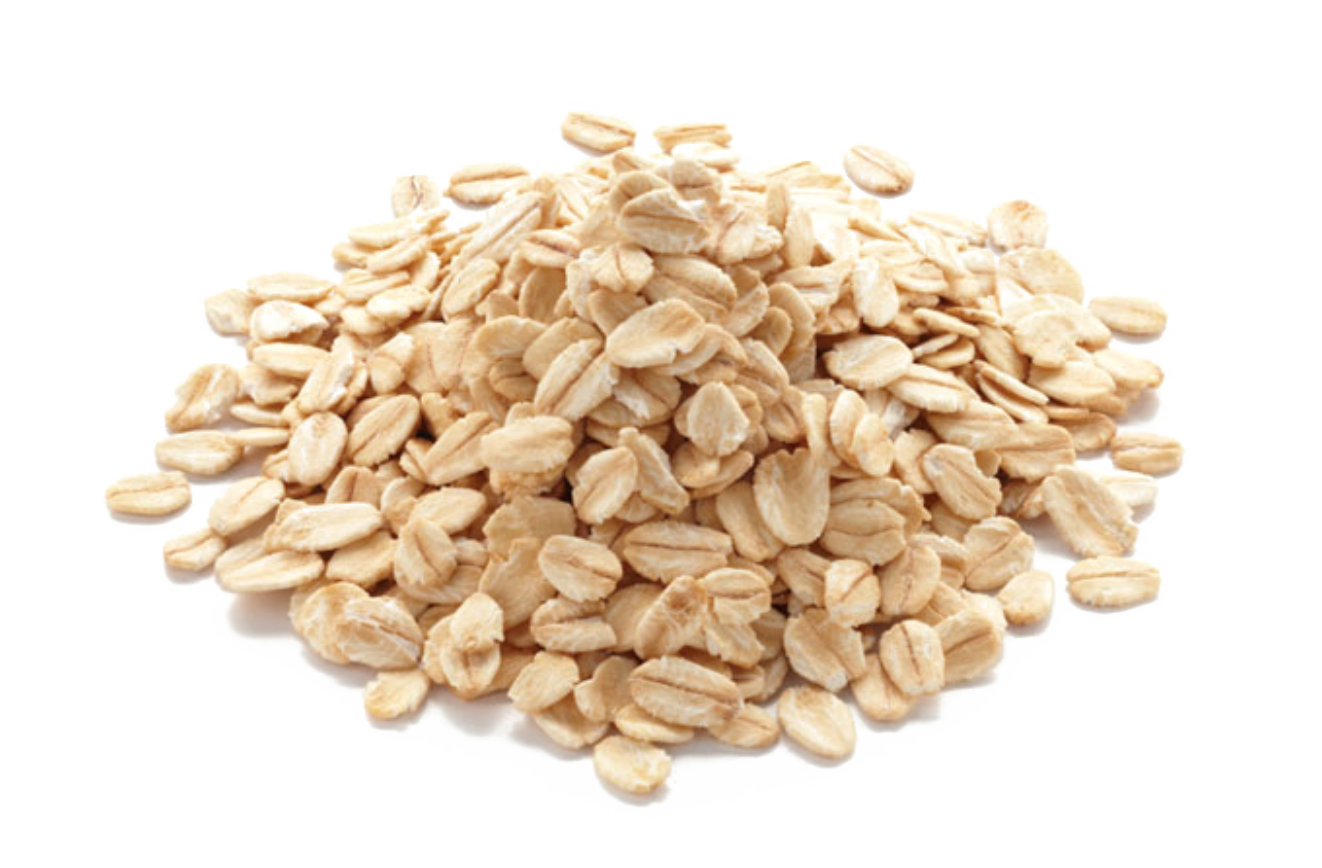 Close Up Rolled Oat Flakes Scattered on White Background PNG Food Ingredient Image