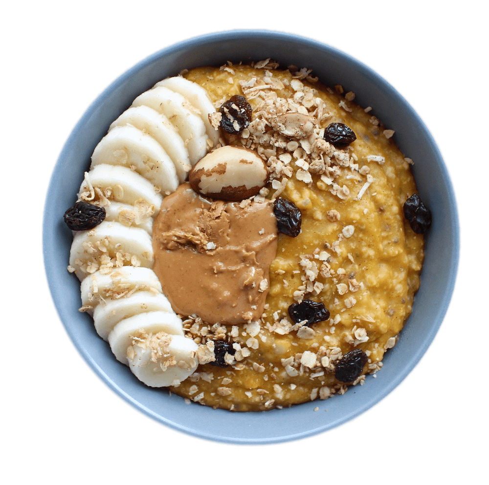 Creamy Oatmeal Bowl with Banana Slices Blueberries and Nuts PNG Breakfast Image