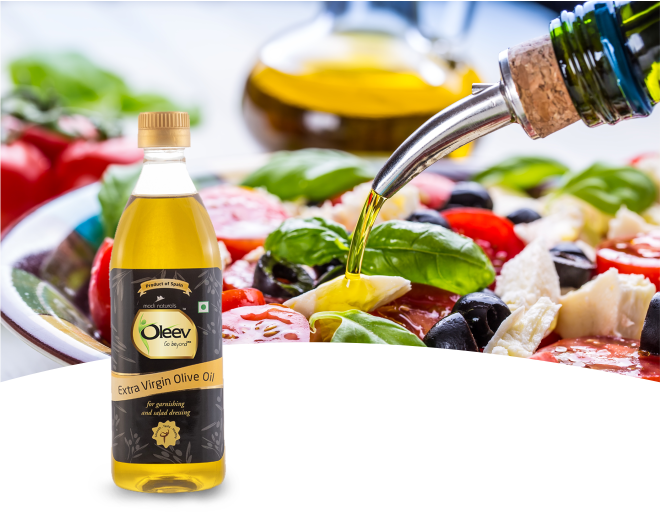 Olive Oil Drizzled Over Fresh Colorful Salad with Bottle PNG Image