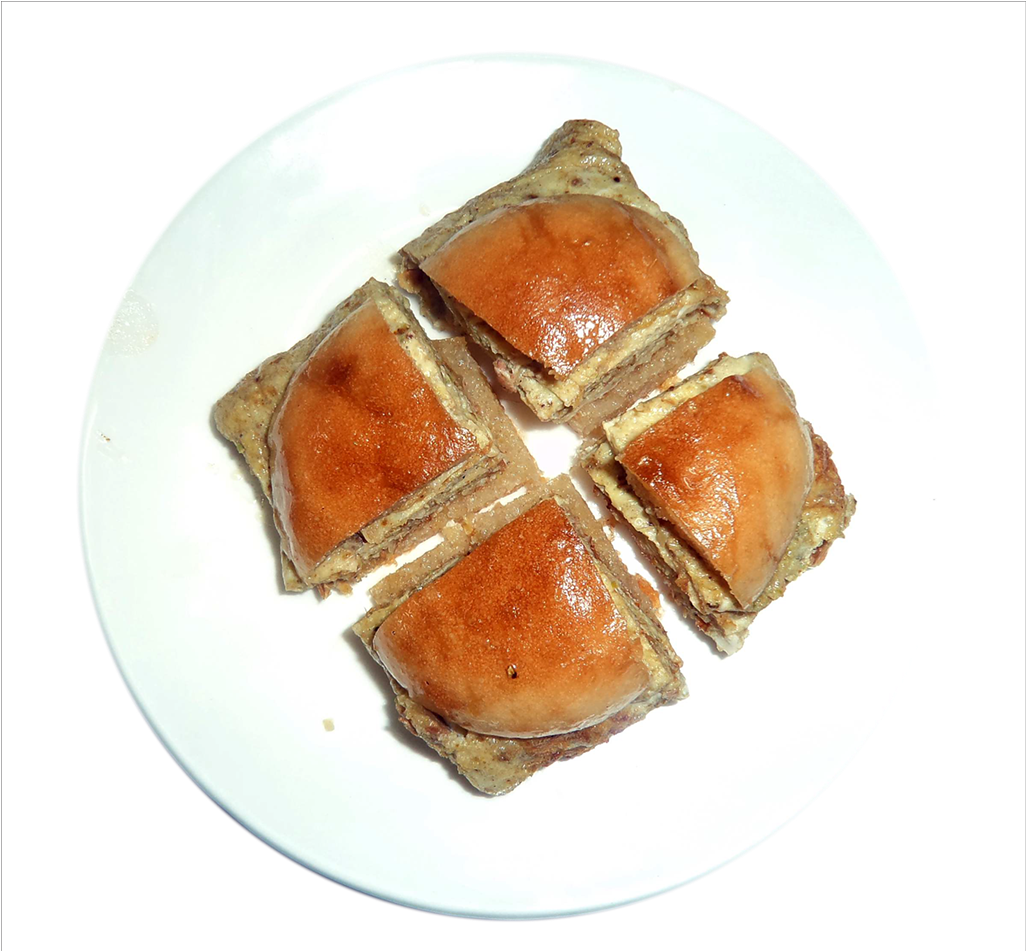 Four Golden Toasted Sandwich Squares with Melted Filling PNG Image