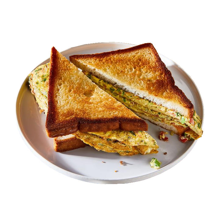 Toasted Cheese Sandwich Triangles with Tomato and Fresh Greens PNG Image