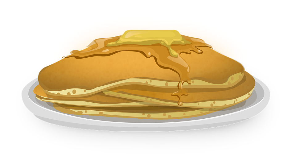 Golden Pancakes Topped with Butter and Rich Maple Syrup PNG Food Image