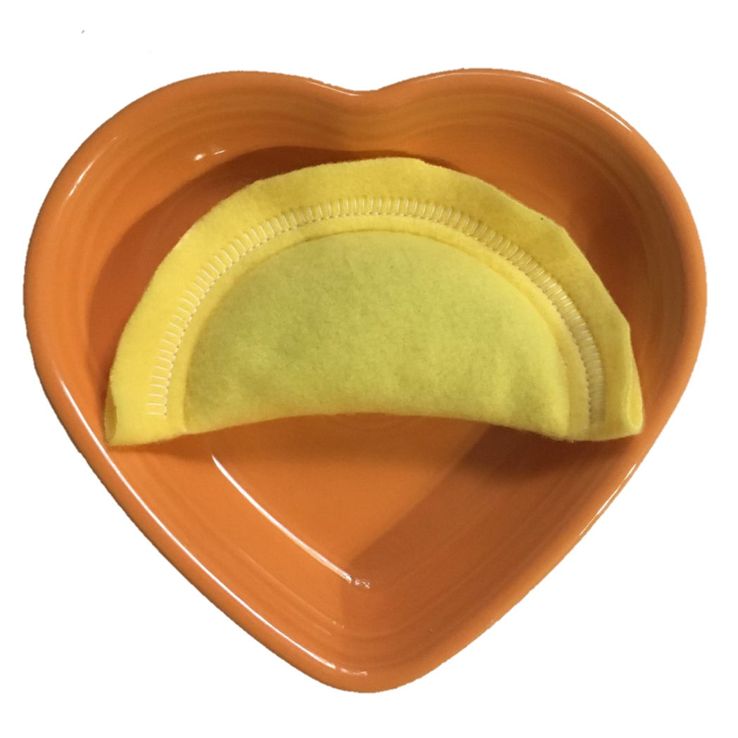 Single Crescent Pierogi in Terracotta Heart Shaped Dish PNG Image