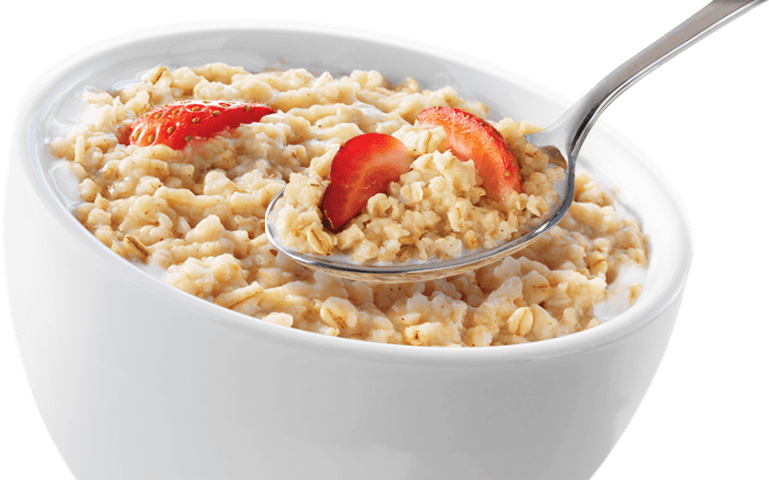 Breakfast Porridge with Fresh Strawberries and Spoon in White Bowl PNG Image