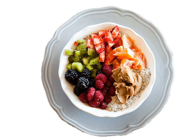 Healthy Oatmeal Bowl Topped with Colorful Fresh Fruit PNG Image