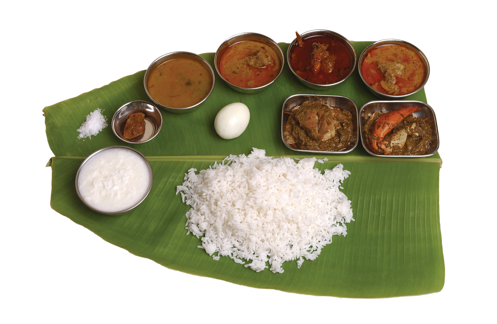 South Indian Rice Meal with Curry Sides Served on Banana Leaf PNG Image