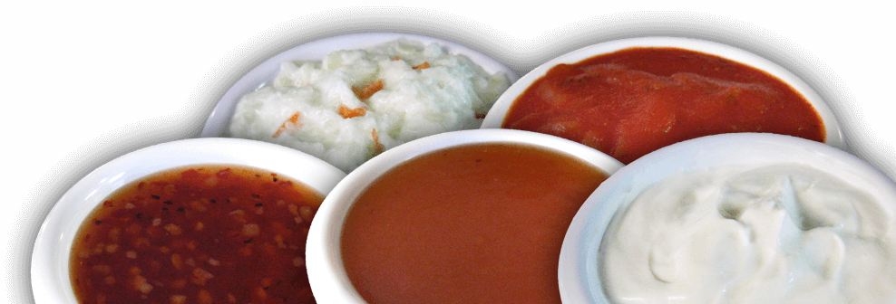 Assorted Tomato Barbecue and Creamy Dipping Sauces in Bowls PNG
