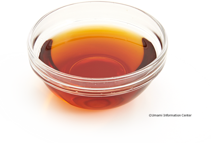Dark Soy Sauce in Clear Glass Bowl Isolated PNG Condiment Image