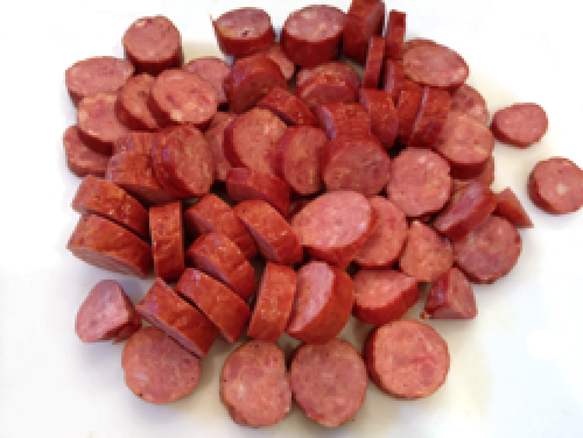 Small Red Meat Sausage Slices Scattered on White Background PNG