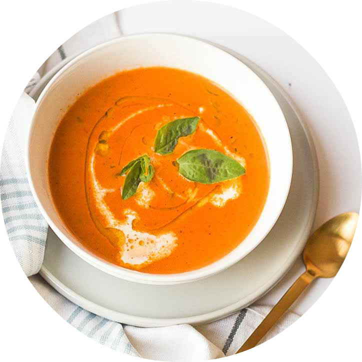 Creamy Carrot Pumpkin Soup Garnished with Fresh Herbs PNG Food Image