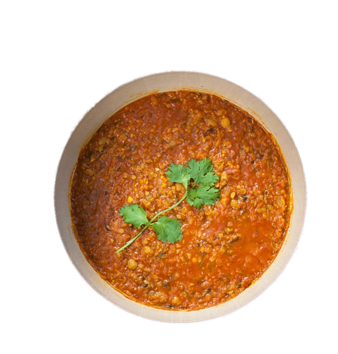 Rustic Spiced Tomato Lentil Soup with Green Herb Garnish PNG Image